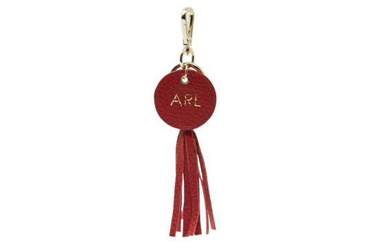 Llavero con colgante de flecos Volcano